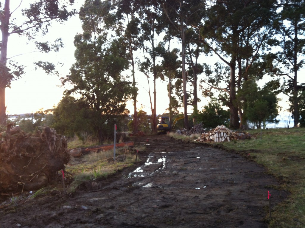 Removing the topsoil to form the driveway