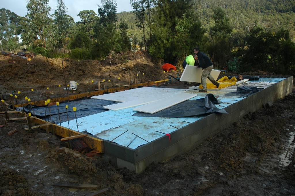 Pete moving the sub-slab insulation into place