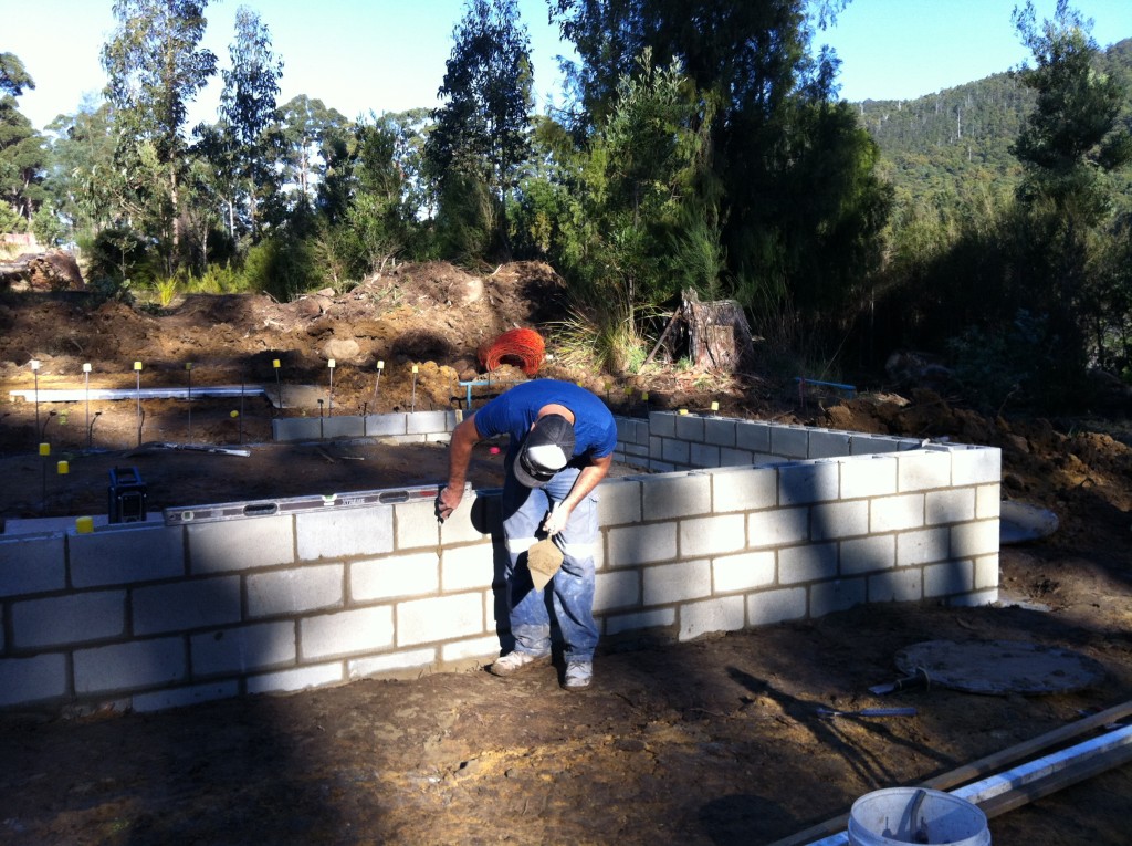 Trent 'pointing' the blocks (finishing off the joints)