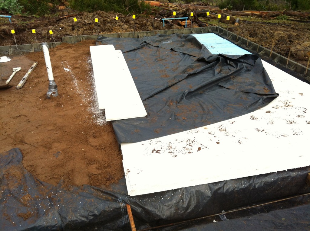 The polystyrene sub-slab insulation can be cut with a handsaw