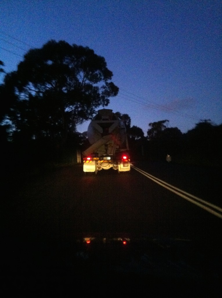 Early start: stuck behind the first concrete truck while driving to site before sunrise