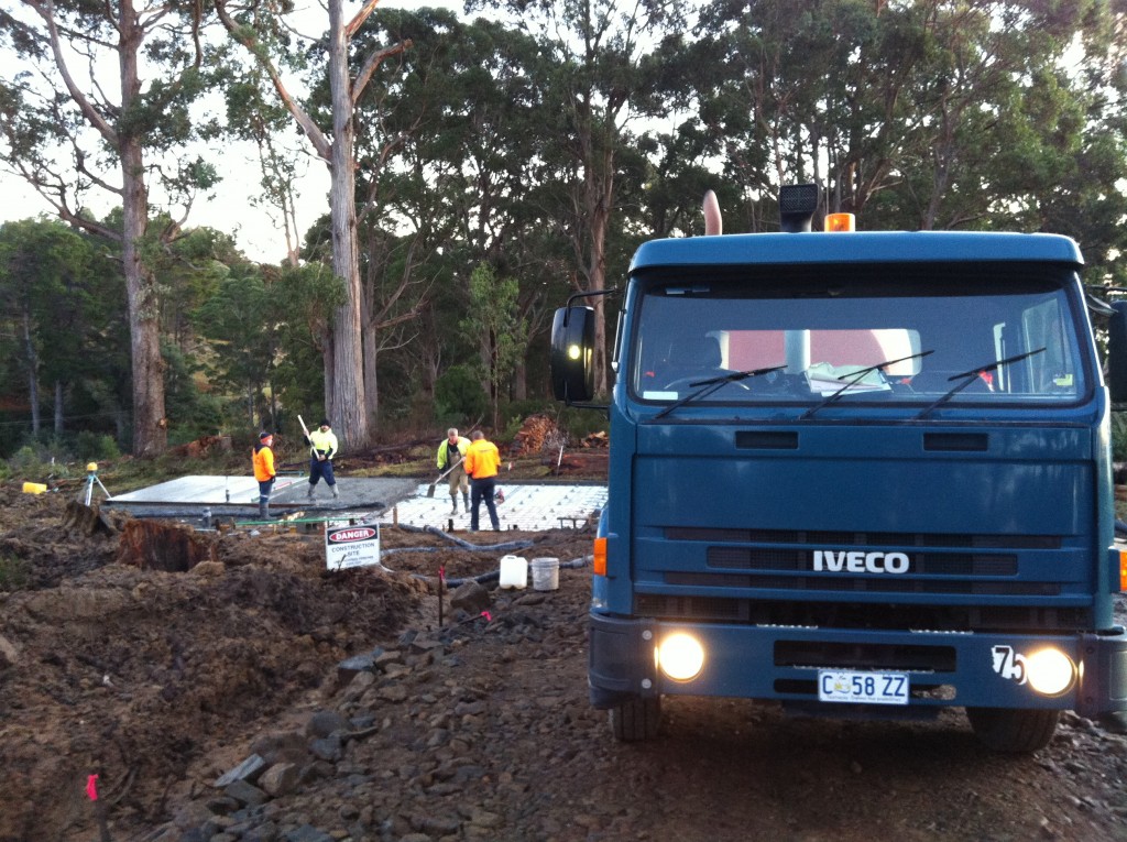 More trucks: pumping the concrete to the slab via a pump truck