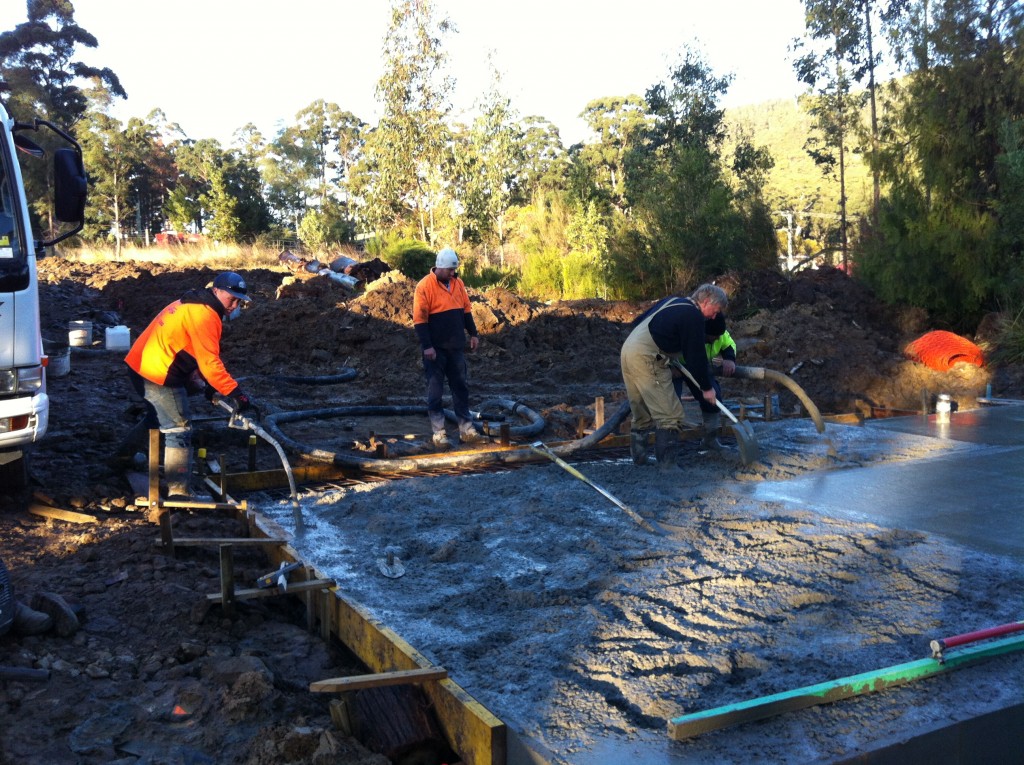 Pumping, leveling and vibrating the concrete