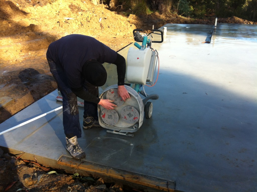 Dean fixing the discs to the grinder