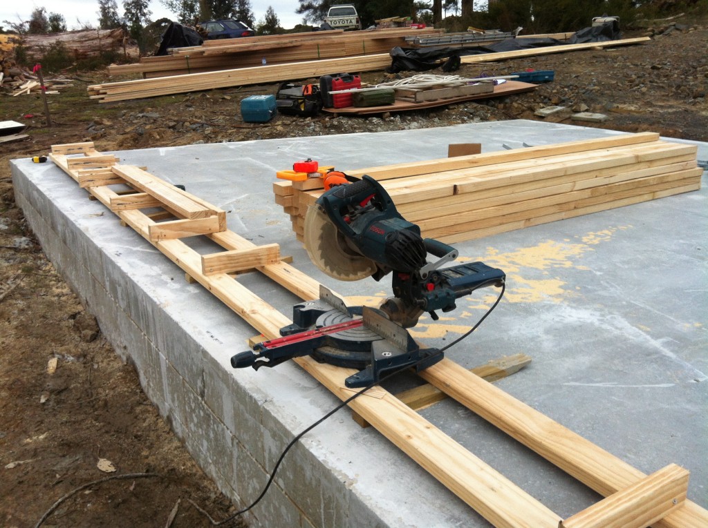 Drop-saw setup ready to cut the studs to length