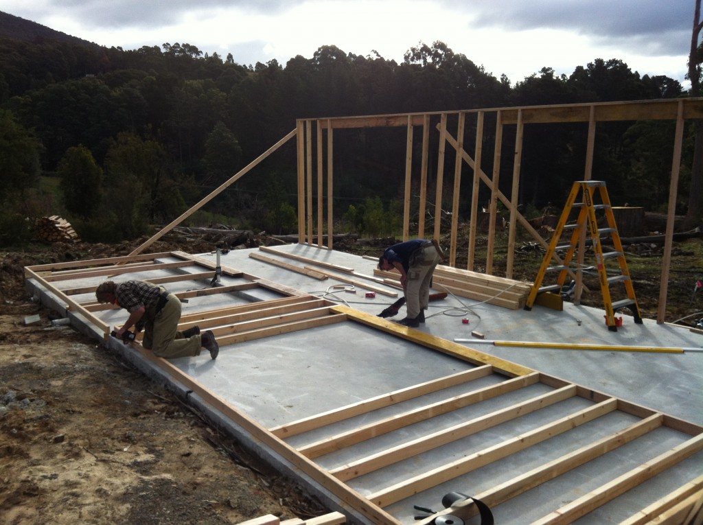 The second wall nearly ready to lift into place