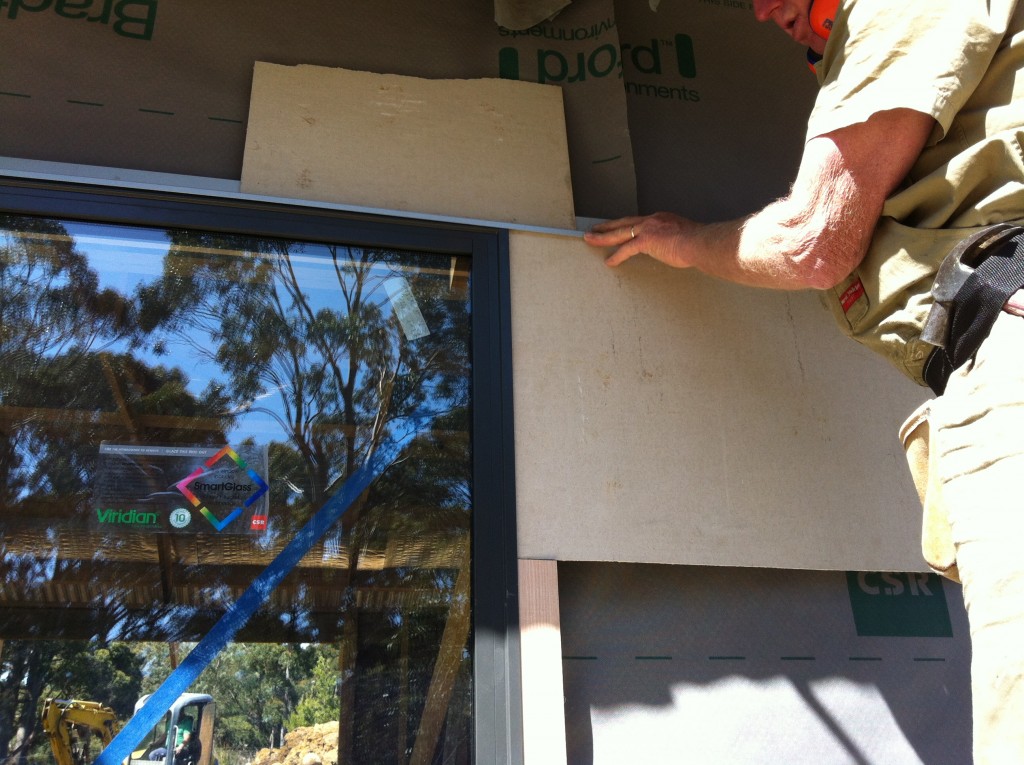 Figuring it out as we go: examining where the cement sheet cladding should sit in relation to the window frame