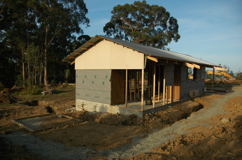 Wind assisted: high winds ripped part of the wall wrap off the timber frame