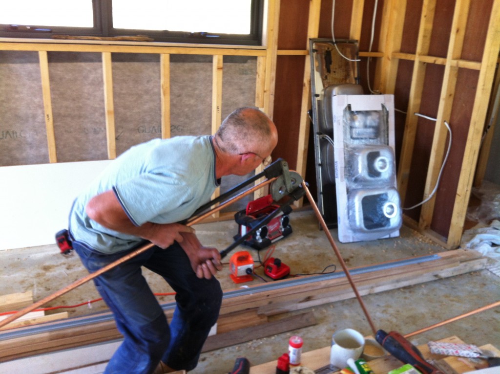 Bend it like Beckham: Ian bending the copper pipe