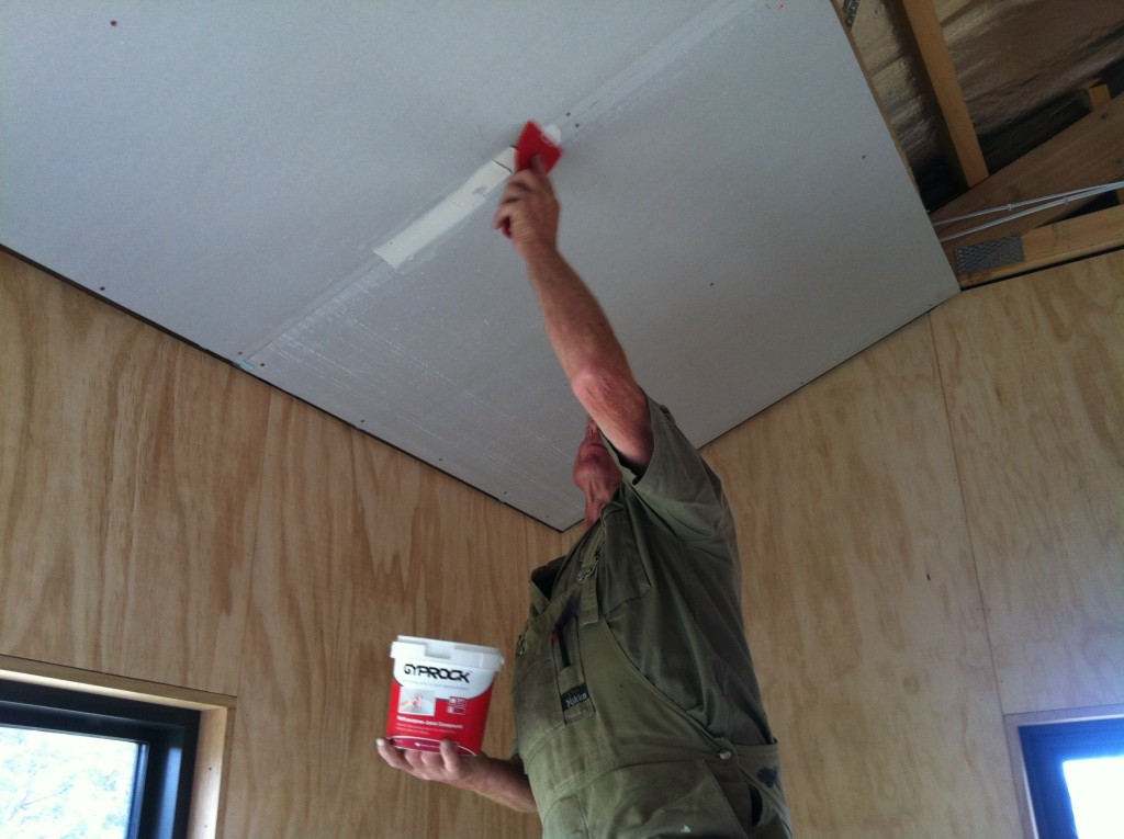 Demonstration: Greg plastering the first join - it was the only plastering he did...