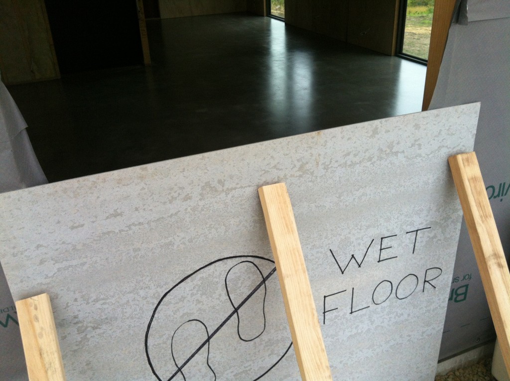 Sign of the times: home made sign indicates not to do the Tassie two-step dance on the wet floor