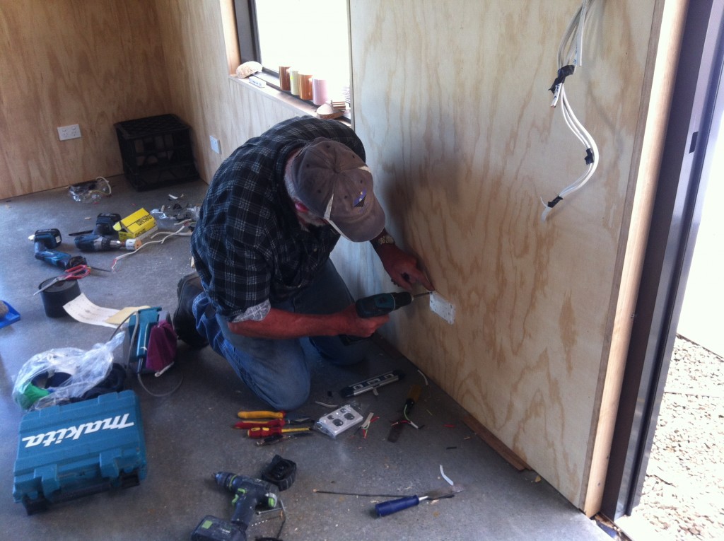 Power it up: Alan installing a power point inside