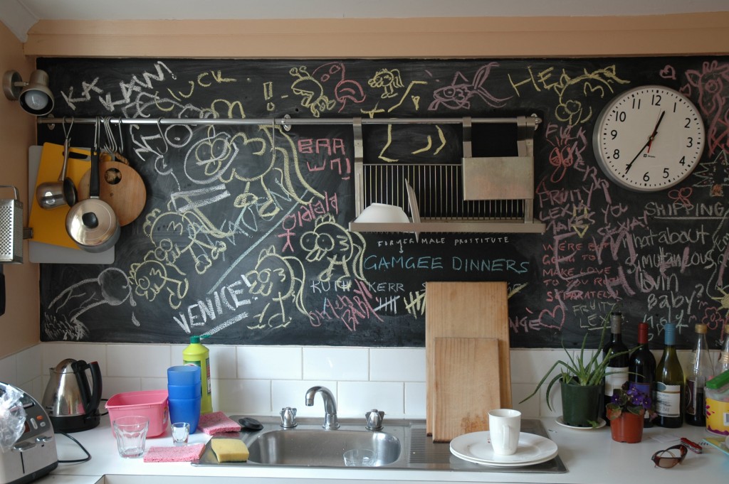 Fun for the whole family: a blackboard splash back can be useful for lists and creative pursuits