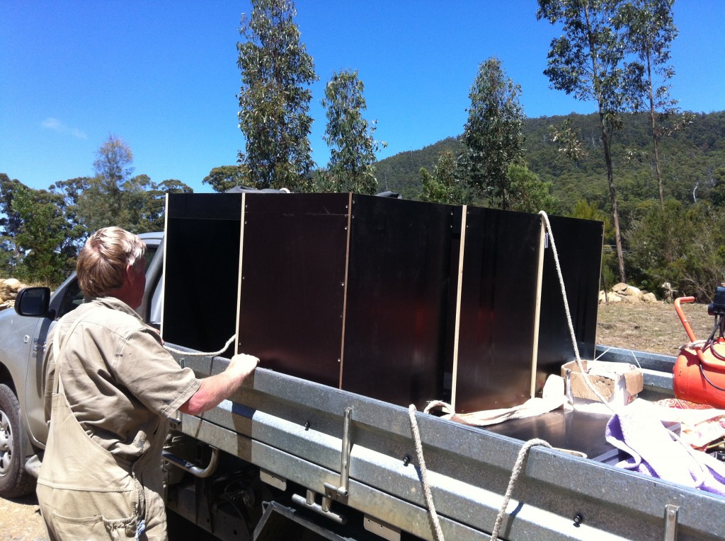 Kitchen delivery: the joinery units being unloaded from the back of Greg's ute