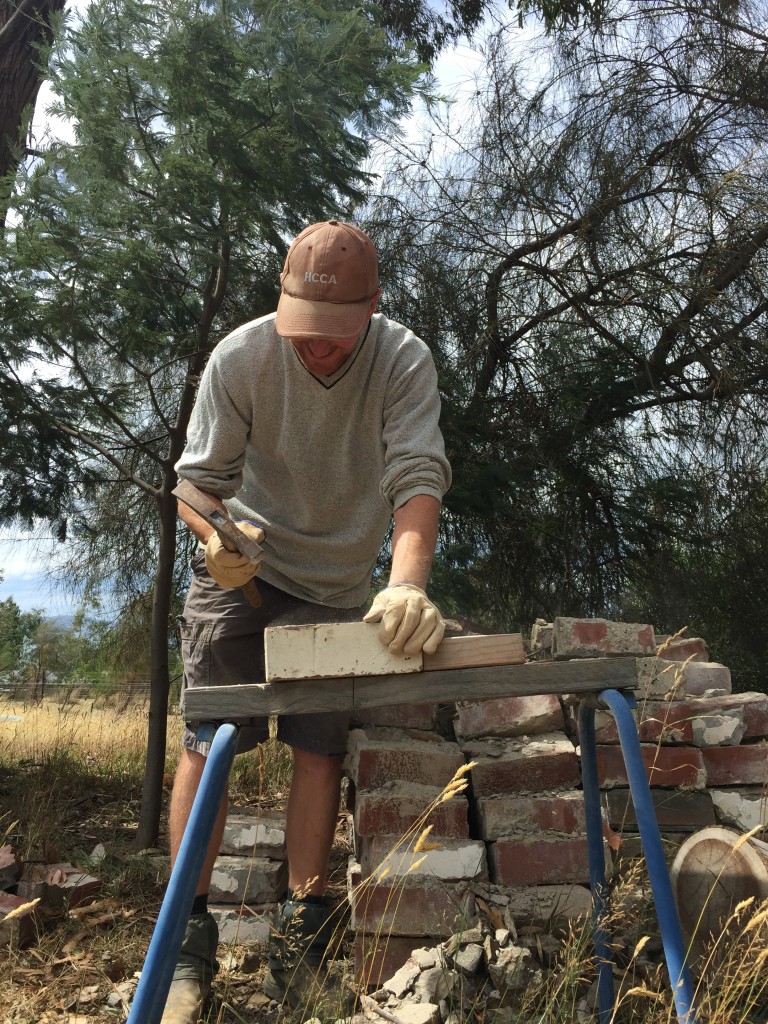 Hours of fun: cleaning bricks, by hand