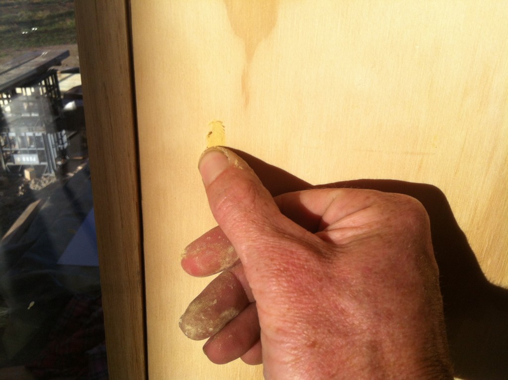 Push it: filling the nail holes with putty