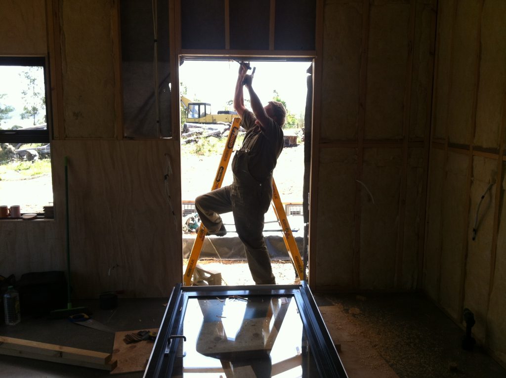 Fixed opening: Greg working on the frame for the kitchen door