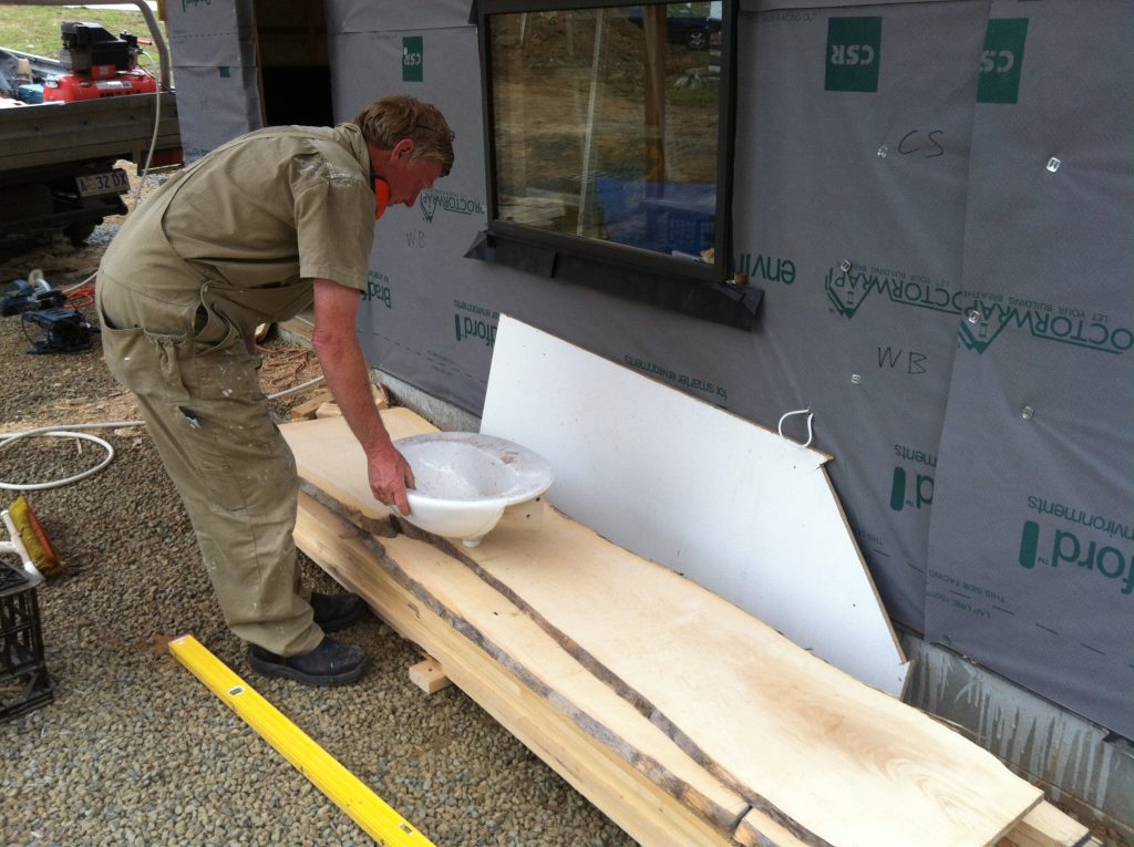 There you go: Greg figuring out where to place the basin in the Huon Pine vanity