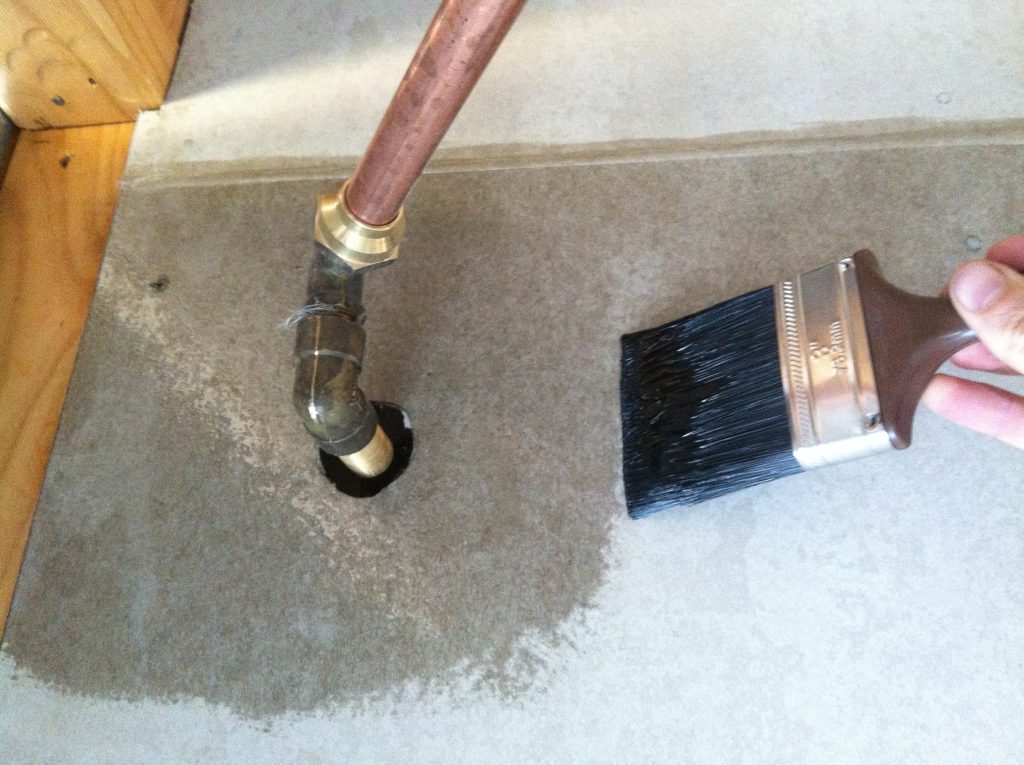 Hole in the wall: brushing the wall around the shower